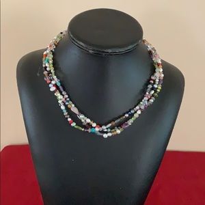 Women’s beats and pearl necklace